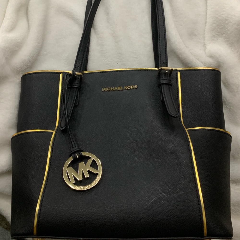 Black and gold MK bag